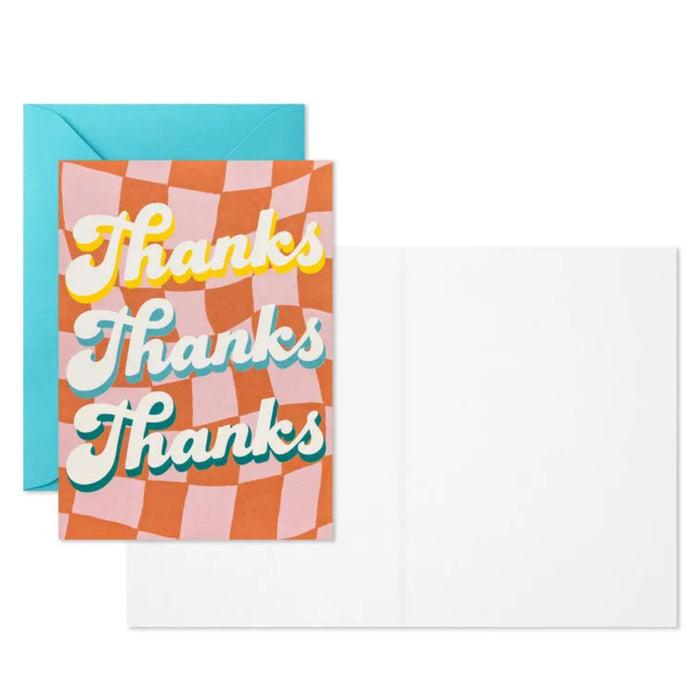 Checkered card with 'Thanks' text and a blue envelope on a white background