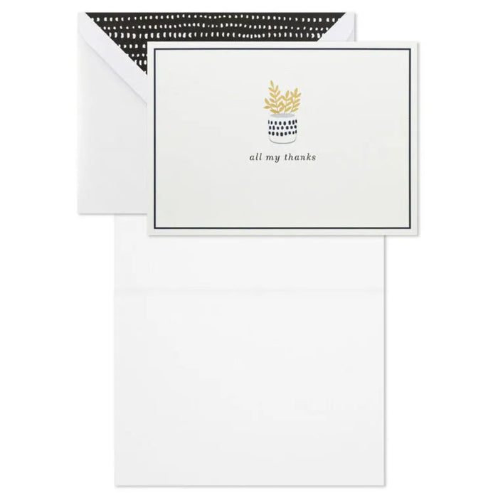 White card with gold text and black border, featuring a small illustration, on a white background.