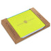 Yellow notebook with 'all grateful' and 'all smiles' text, in a brown cardboard box on a white background.
