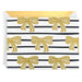 Card with gold bows on black and white striped pattern