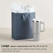 Cream Hallmark gift bag with gold interior and laser-cut roses