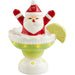 Decorative figure of Santa Claus with a lime wedge on a white background