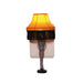 Novelty lamp with a yellow shade and black fringe, resembling legs wearing fishnet stockings night light on a white background.