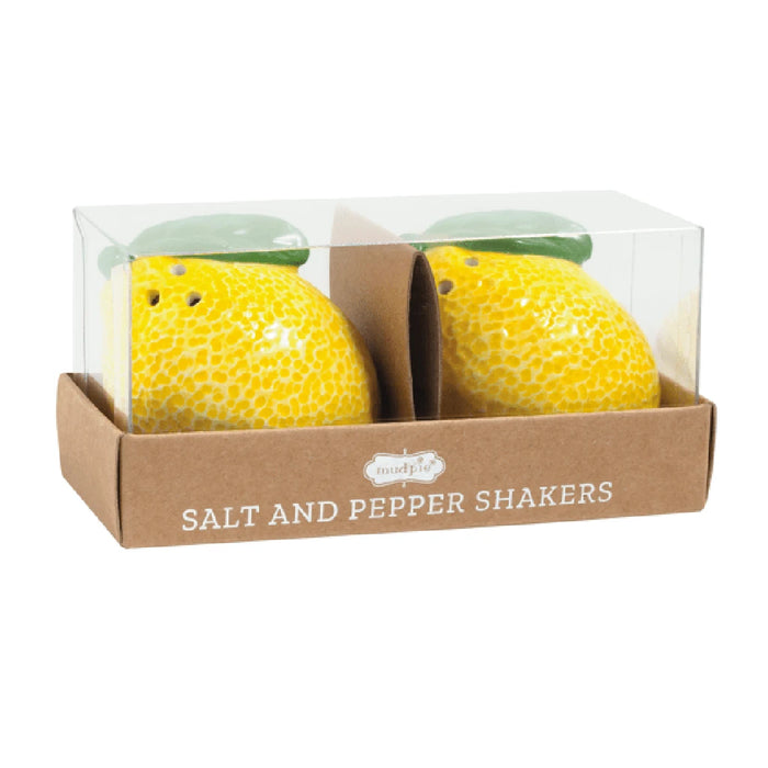 Salt and pepper shakers neatly arranged inside a decorative box.