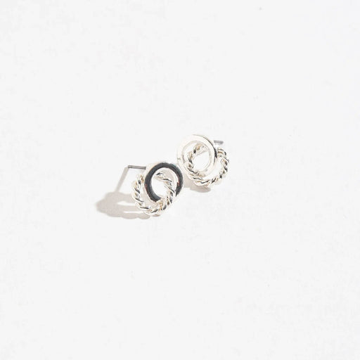 Howards Inc Linked Rings Ear Sense Earrings featuring a polished silver-tone linked rings design with hypoallergenic Ear Sense posts, comfortable wear for sensitive and pierced ears, and elegant gift-ready packaging.