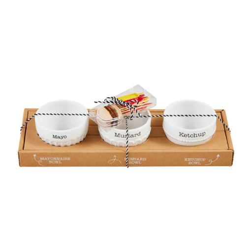 Three bowls are neatly arranged in a box alongside a greeting card.