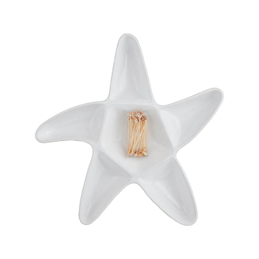 A white star-shaped dish featuring a gold star design on its surface.