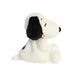 A stuffed toy dog with a bright red collar, resting on a clean white surface, emphasizing its cuddly appearance.