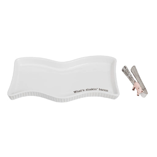 A white tray holding two pairs of scissors, positioned side by side for easy access and visibility.