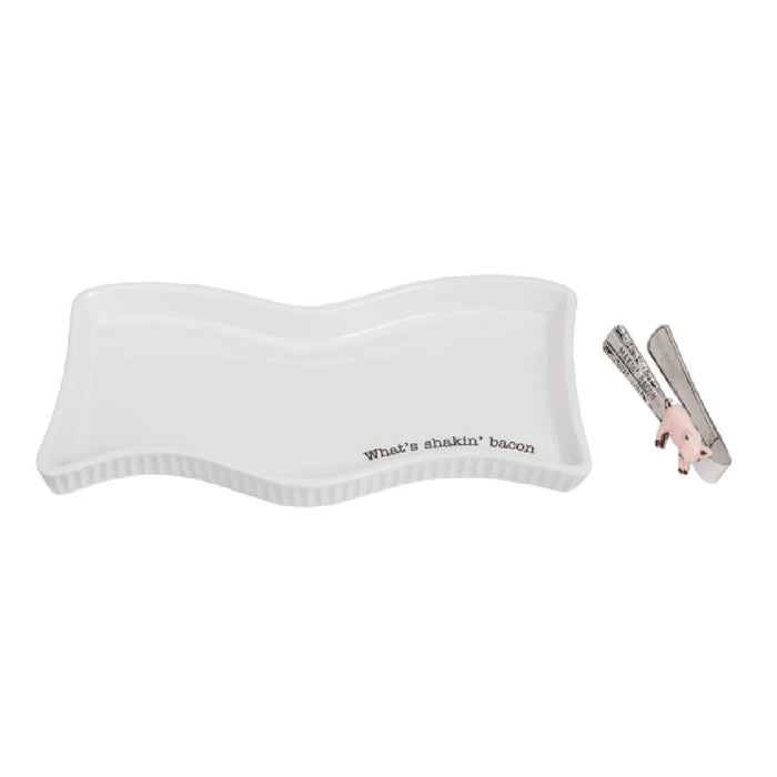 A white tray holding two pairs of scissors, positioned side by side for easy access and visibility.