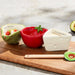 Three different food types are displayed in a bowl, highlighting their unique colors and shapes.