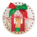 Decorative plate with a gift box design featuring a red bow and tag on a white background.
