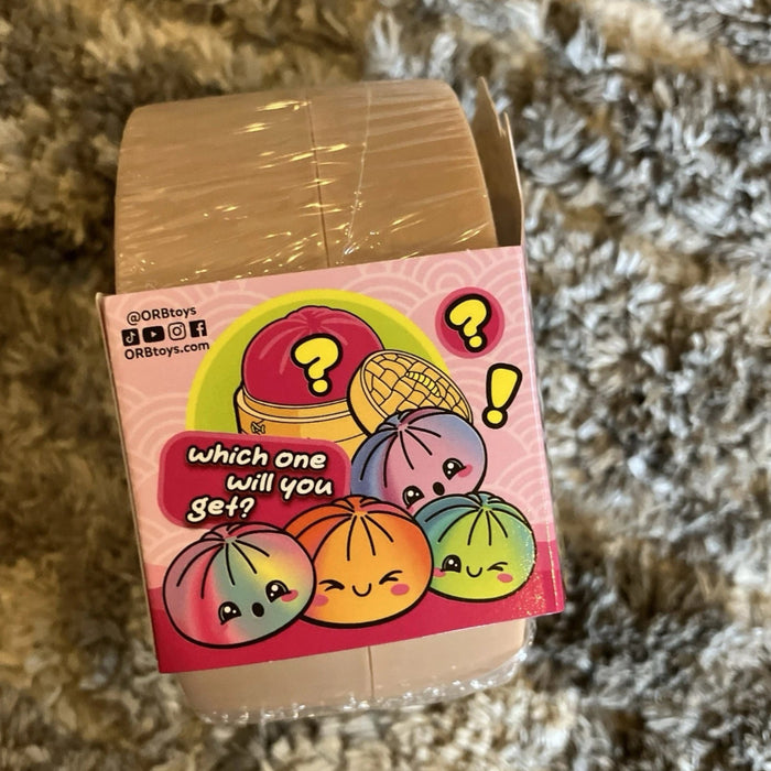 The Orb Toys Viral Tie Dye Mystery Squishy Bun Dumpling delivers a satisfying slow-rise squeeze every time.