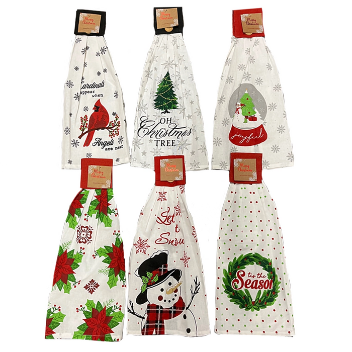 Set of Christmas-themed kitchen towels with various designs on a white background