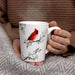 The Pavilion Gift Co Cardinal 13 oz Cup showcases a stunning cardinal design that celebrates nature and remembrance.