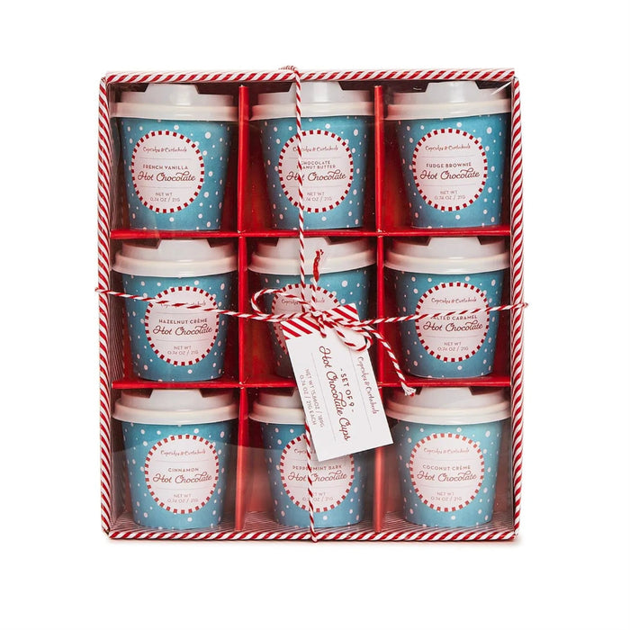 Set of hot chocolate cups in a decorative box with a tag.