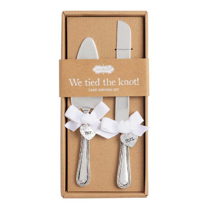 Elegant wedding cake and knife set featuring "We Tied the Knot" inscription, perfect for celebrating a marriage.