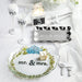 Wedding cake and knife set adorned with "We Tied the Knot," symbolizing love and commitment on the special day.