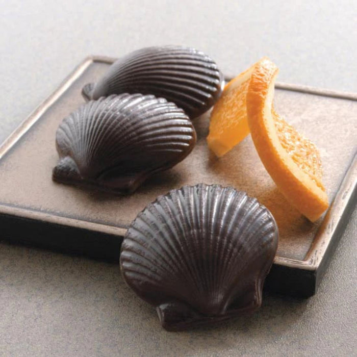 It is a beautiful reproduction of an actual scallop shell we brought home from the beach one summer day.