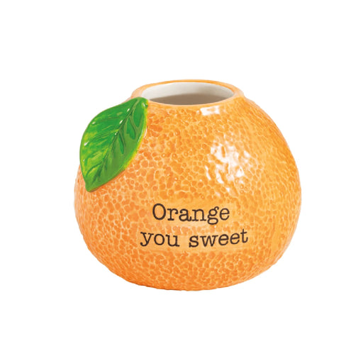 A vibrant orange vase with a playful design, filled with colorful flowers, conveying a cheerful and sweet aesthetic.