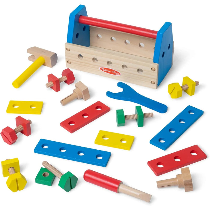 A wooden toolbox containing an assortment of tools alongside vibrant toys, illustrating a mix of work and play.