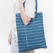 This Inked Blue Library Card Tote Bag is a stylish and functional accessory for book lovers, readers, and library enthusiasts.