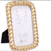 Featuring a classic rope-inspired design with a luxurious gold finish