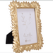  Featuring a delicate floral design and a stunning gold finish.