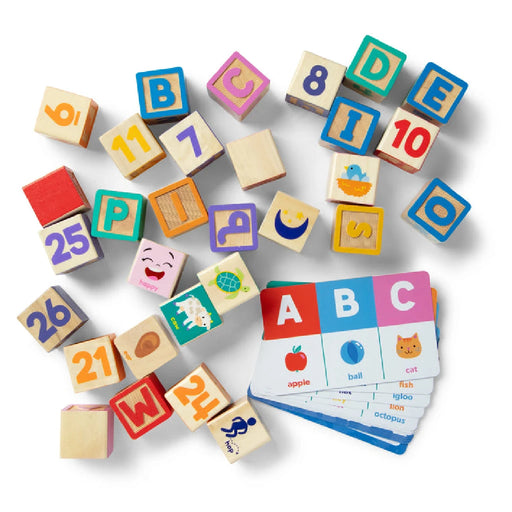 A wooden block displaying the letters A to Y in uppercase and lowercase, arranged in a sequential order.
