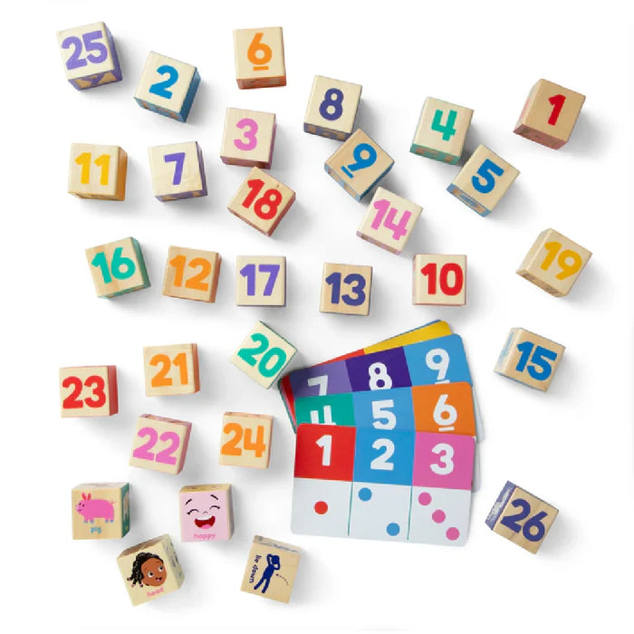 A wooden block featuring the alphabet from A to Y, showcasing both uppercase and lowercase letters.