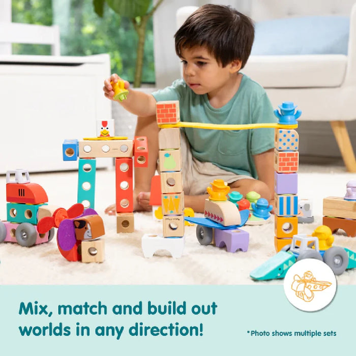A delightful wooden toy set featuring a variety of farm animals, including a tractor, enhancing children's imaginative play.