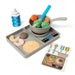 A tray displaying an assortment of food items alongside utensils for dining.