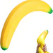 Large inflatable banana held by a hand against a white background
