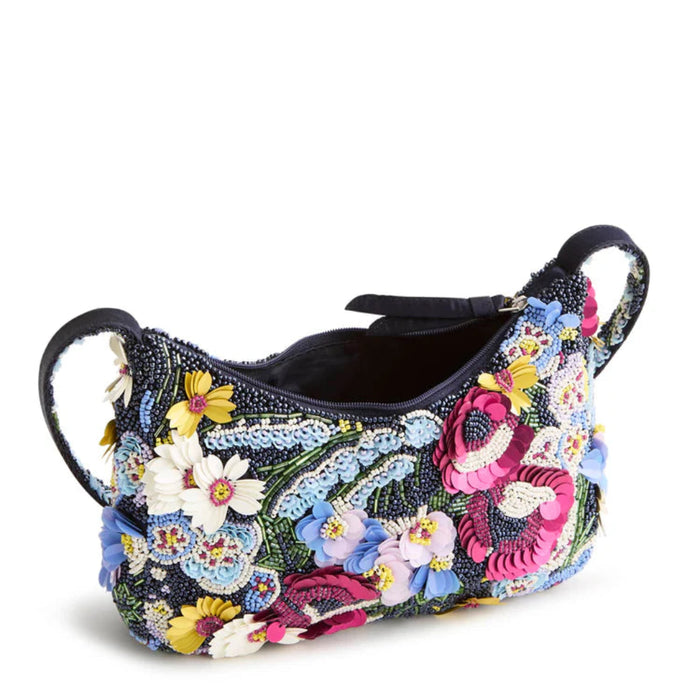 Beautiful and well-made bag! The size is perfect and the handle drop is ideal.