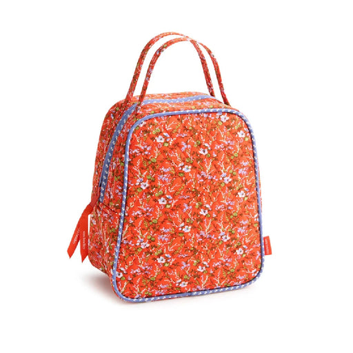An orange floral lunch bag made from fabric, featuring a vibrant pattern of flowers on a bright background.