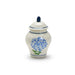 A decorative jar in blue and white, adorned with a floral pattern.