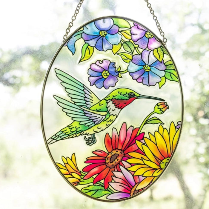 This handcrafted stained glass suncatcher features a stunning hummingbird design in rich, jewel-toned art glass.
