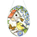 7-inch stained-glass-style Birdsong Goldfinch suncatcher with vibrant yellow and black details hanging in a sunny window.