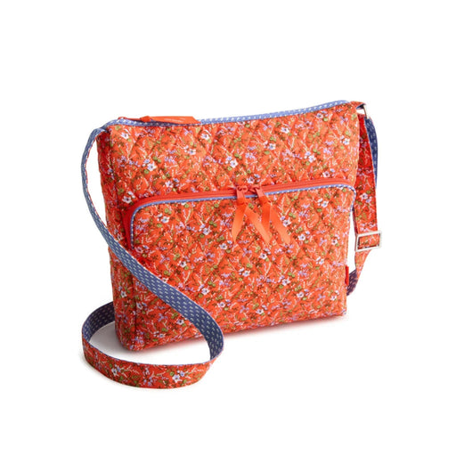 Orange floral print crossbody bag made from soft fabric, ideal for casual outings and stylish accessories.
