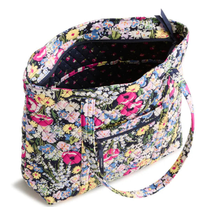 This classic large tote pairs effortless style with everyday practicality, offering generous space