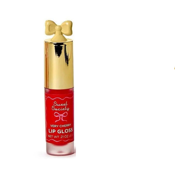 Very cherry lip gloss with gold caps on a white background