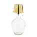 Clear glass bottle with a gold metallic  LED Lamp cap on a white background