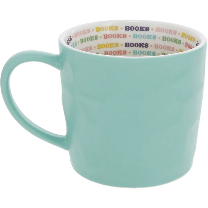  The Pavilion Gift Co One More Chapter 16 oz Mug features a playful design that celebrates the joy of getting lost in a great book. 