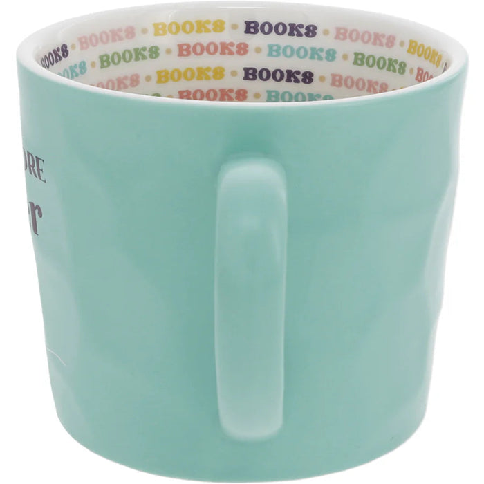  The Pavilion Gift Co One More Chapter 16 oz Mug features a playful design that celebrates the joy of getting lost in a great book. 