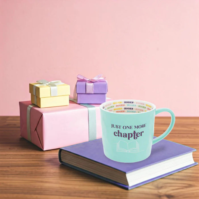  The Pavilion Gift Co One More Chapter 16 oz Mug features a playful design that celebrates the joy of getting lost in a great book. 