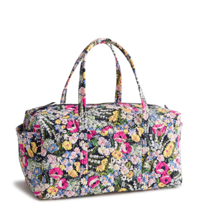 Designed for the modern explorer, this spacious duffel offers ample storage space coupled with stylish details