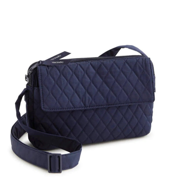Vera Bradley Tasha Triple Compartment Crossbody bag in Peacoat navy with multiple compartments and adjustable strap.