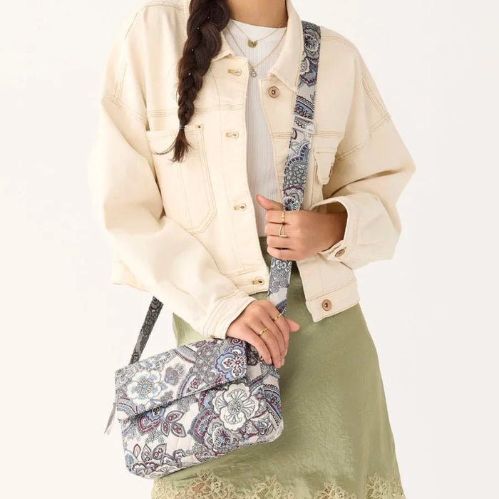 Vera Bradley Tasha Triple Compartment Crossbody in Neutral Rhapsody pattern with multiple compartments and adjustable strap.