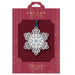 Decorative snowflake ornament in Beacon Design packaging on a white background