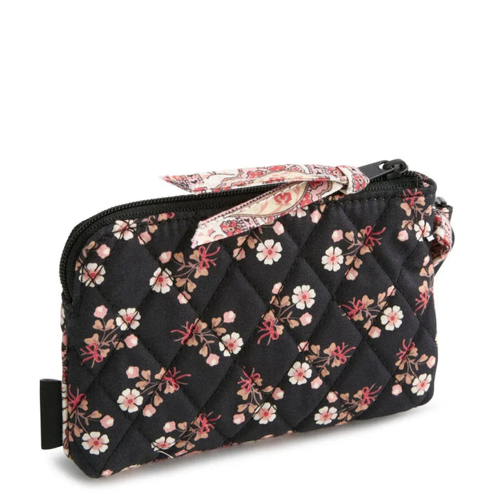 Vera Bradley Clip & Zip Wristlet in Melissa Ditsy floral pattern with a zip closure and convenient wristlet strap.